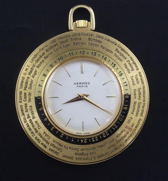 A Hermes World Time gilt brass pocket watch.